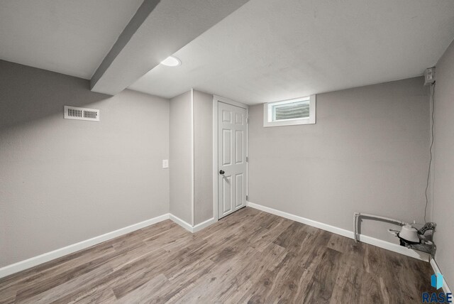 209 E Elm St, Harrisburg, SD 57032 - basement with wood finished floors and baseboards