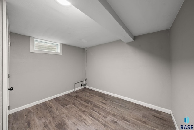 209 E Elm St, Harrisburg, SD 57032 - below grade area featuring wood finished floors and baseboards