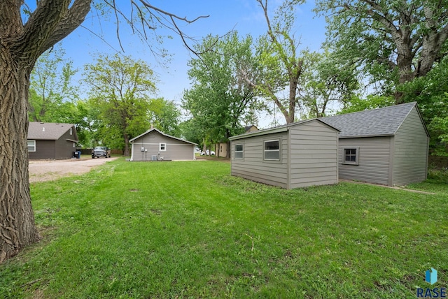 209 E Elm St, Harrisburg, SD 57032 - view of green lawn with an outdoor structure