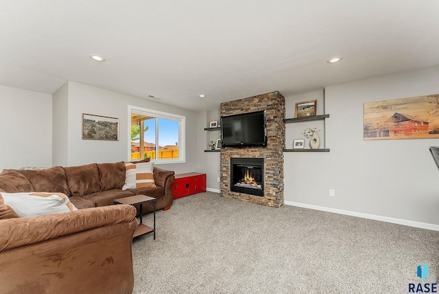 1302 Ripple Creek Rd, Dell Rapids, SD 57022 - carpeted living room featuring a stone fireplace, baseboards, and recessed lighting