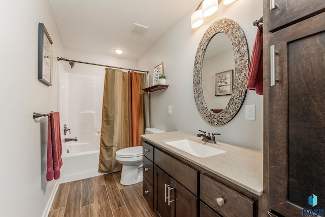 1302 Ripple Creek Rd, Dell Rapids, SD 57022 - full bathroom with vanity, toilet, shower / tub combo, and wood finished floors