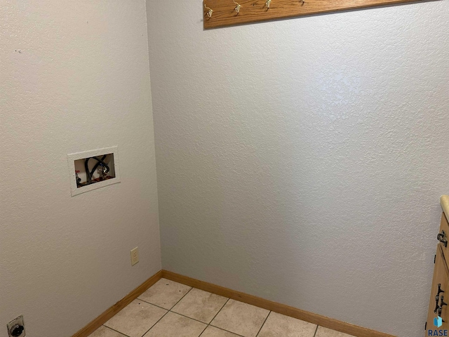 800 N Poplar St, Bridgewater, SD 57319 - washroom featuring washer hookup, baseboards, and light tile patterned floors