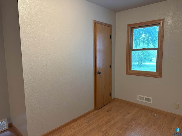 800 N Poplar St, Bridgewater, SD 57319 - unfurnished room with light wood finished floors and baseboards