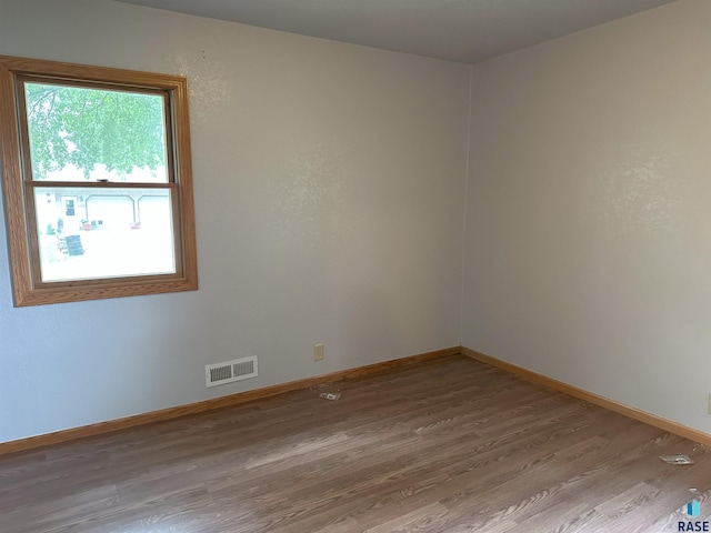 800 N Poplar St, Bridgewater, SD 57319 - unfurnished room featuring wood finished floors and baseboards