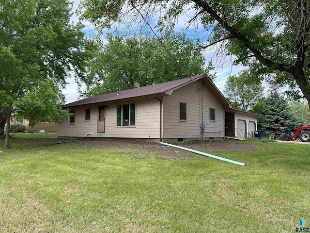 800 N Poplar St, Bridgewater, SD 57319 - back of property featuring a yard and a chimney
