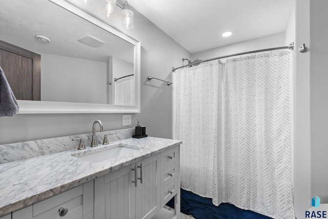 7305 W Jacob Cir, Sioux Falls, SD 57106 - bathroom with vanity and a shower with shower curtain