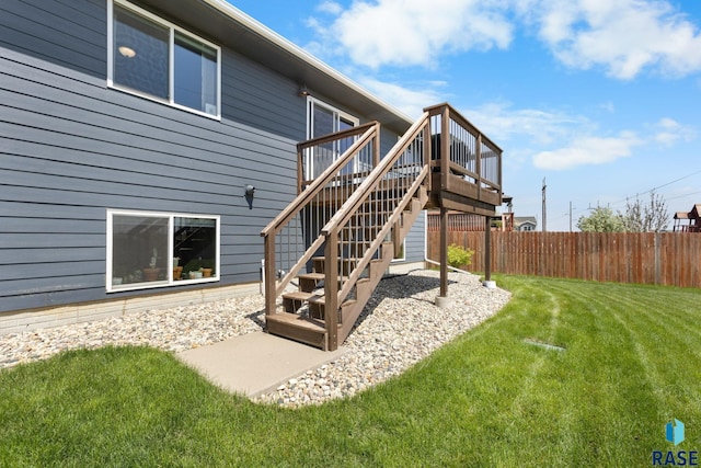 7305 W Jacob Cir, Sioux Falls, SD 57106 - rear view of property featuring a wooden deck and stairs