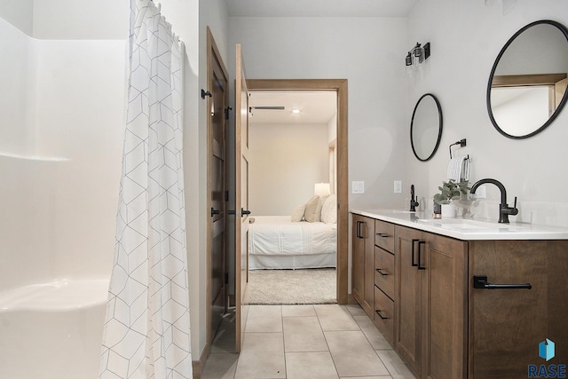 501 S Huckleberry Trl, Harrisburg, SD 57032 - ensuite bathroom with double vanity and tile patterned floors