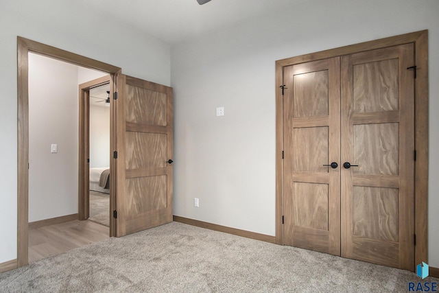 501 S Huckleberry Trl, Harrisburg, SD 57032 - unfurnished bedroom featuring light colored carpet and baseboards