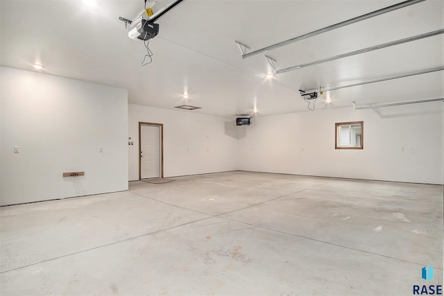 501 S Huckleberry Trl, Harrisburg, SD 57032 - garage featuring a garage door opener