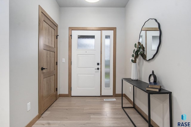 501 S Huckleberry Trl, Harrisburg, SD 57032 - entryway featuring light wood-style floors and baseboards