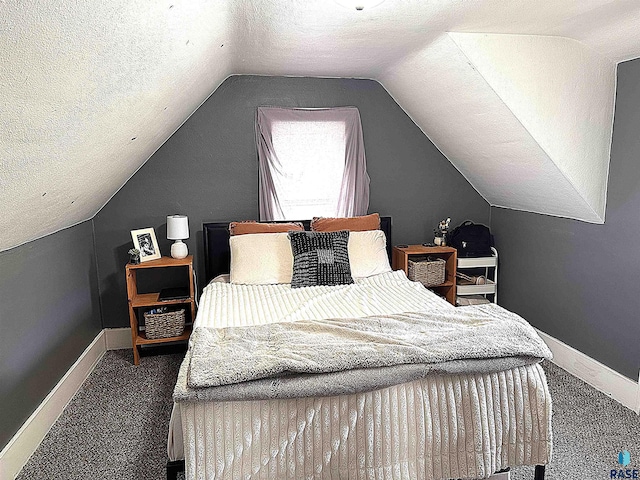 816 W 4th St, Canton, SD 57013 - bedroom featuring carpet flooring, baseboards, vaulted ceiling, and a textured ceiling