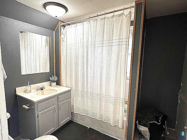 816 W 4th St, Canton, SD 57013 - bathroom featuring vanity and shower / bathtub combination with curtain