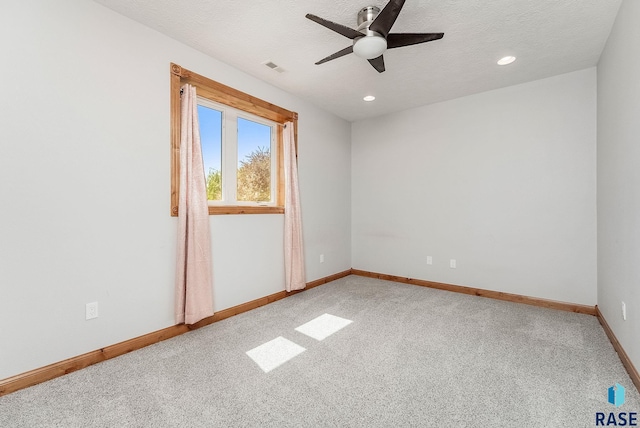 1817 W Ashton Trl, Brandon, SD 57005 - empty room featuring a ceiling fan, light colored carpet, recessed lighting, baseboards, and a textured ceiling