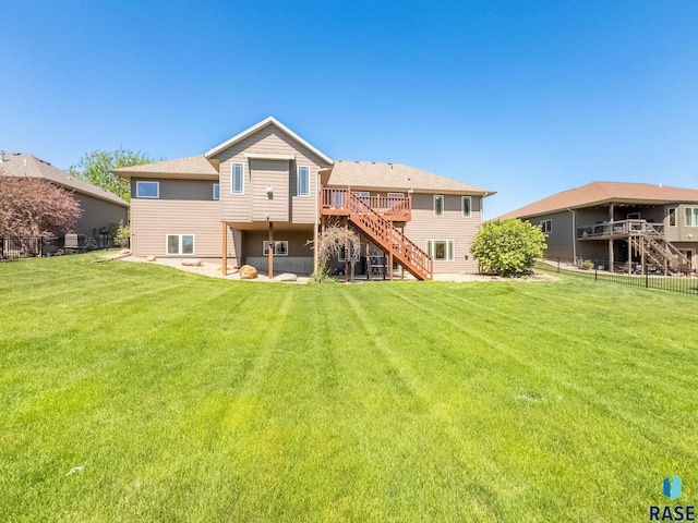 1817 W Ashton Trl, Brandon, SD 57005 - rear view of house with stairs and a wooden deck
