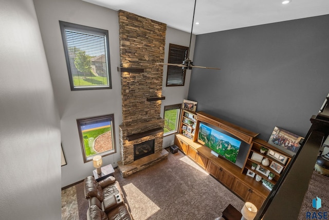 1301 S Hyannis Port Ln, Sioux Falls, SD 57106 - living room with a fireplace, carpet flooring, and recessed lighting