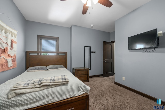 1301 S Hyannis Port Ln, Sioux Falls, SD 57106 - bedroom with light carpet, baseboards, and a ceiling fan