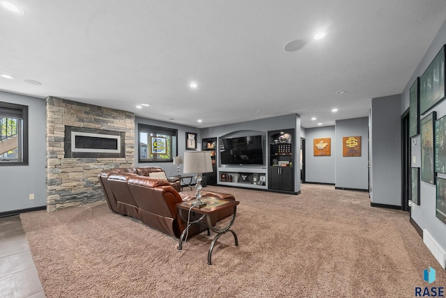 1301 S Hyannis Port Ln, Sioux Falls, SD 57106 - living area featuring recessed lighting, healthy amount of natural light, baseboards, and carpet floors