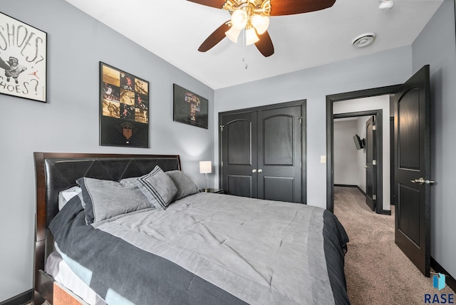 1301 S Hyannis Port Ln, Sioux Falls, SD 57106 - carpeted bedroom featuring baseboards, a closet, and a ceiling fan
