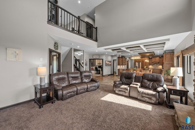 1301 S Hyannis Port Ln, Sioux Falls, SD 57106 - living room featuring stairway, carpet floors, coffered ceiling, baseboards, and a high ceiling