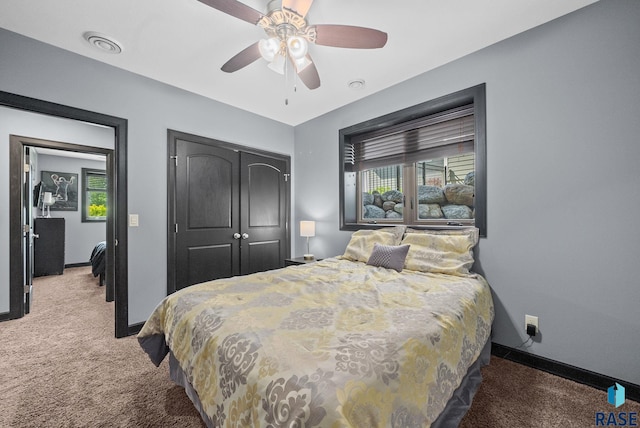 1301 S Hyannis Port Ln, Sioux Falls, SD 57106 - bedroom featuring carpet, baseboards, a closet, and ceiling fan