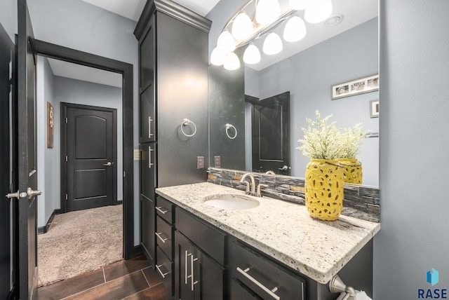 1301 S Hyannis Port Ln, Sioux Falls, SD 57106 - bathroom with vanity and wood finished floors