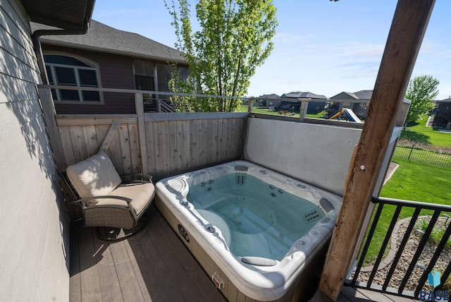 1301 S Hyannis Port Ln, Sioux Falls, SD 57106 - view of patio / terrace featuring a covered hot tub and a residential view