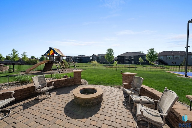 1301 S Hyannis Port Ln, Sioux Falls, SD 57106 - view of patio / terrace featuring a fire pit and a residential view