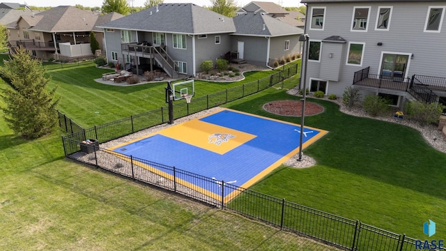 1301 S Hyannis Port Ln, Sioux Falls, SD 57106 - view of basketball court featuring basketball hoop, a residential view, and stairway