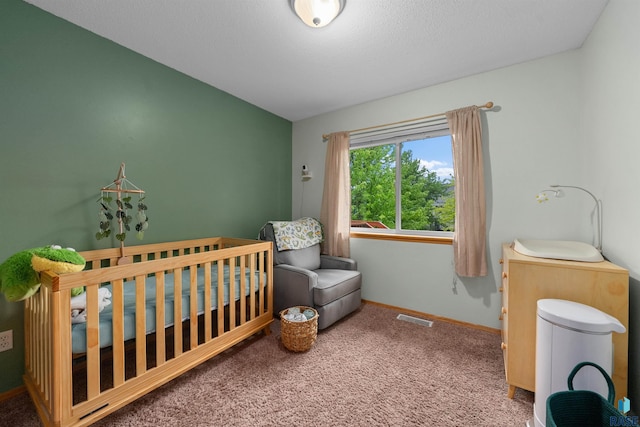 7308 W 53rd St, Sioux Falls, SD 57106 - bedroom with carpet floors, baseboards, and a crib