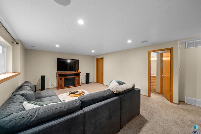 7308 W 53rd St, Sioux Falls, SD 57106 - living room with recessed lighting, light colored carpet, baseboards, and a fireplace
