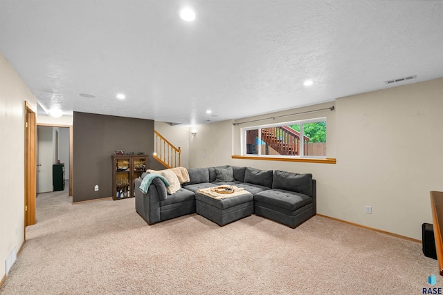 7308 W 53rd St, Sioux Falls, SD 57106 - living room featuring carpet flooring, stairway, recessed lighting, baseboards, and a textured ceiling