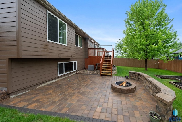 7308 W 53rd St, Sioux Falls, SD 57106 - view of patio / terrace featuring a fire pit, stairway, and a deck