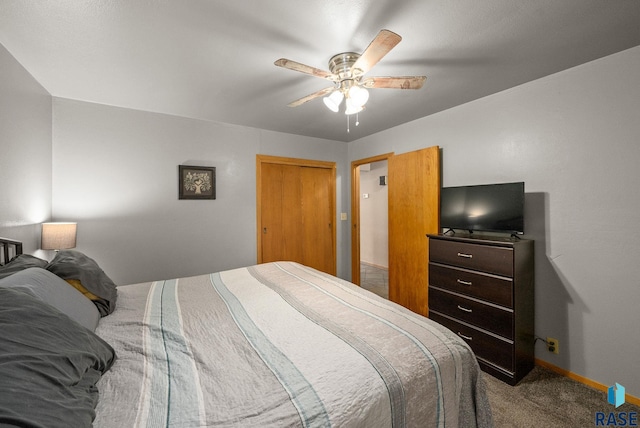 350 W Maple St, Edgerton, MN 56128 - carpeted bedroom with baseboards and ceiling fan