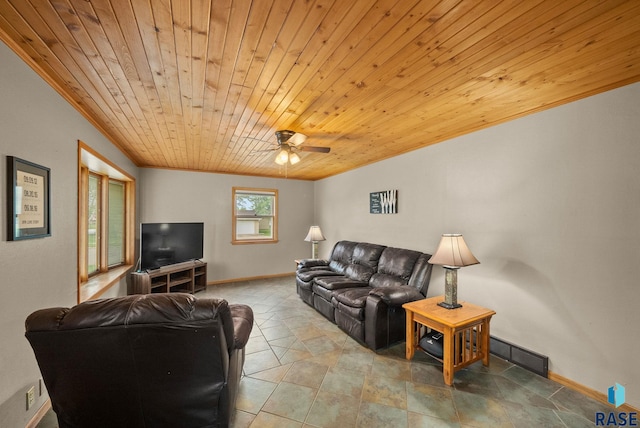 350 W Maple St, Edgerton, MN 56128 - living area with wood ceiling, ornamental molding, ceiling fan, and baseboards