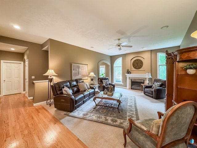 108 W Hazeltine Ln, Sioux Falls, SD 57108 - living area with ceiling fan, a glass covered fireplace, recessed lighting, baseboards, and carpet flooring