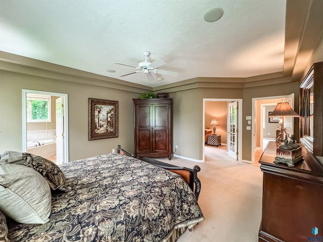 108 W Hazeltine Ln, Sioux Falls, SD 57108 - bedroom with light colored carpet, baseboards, ensuite bathroom, and ceiling fan