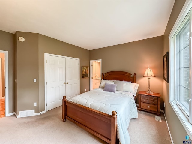 108 W Hazeltine Ln, Sioux Falls, SD 57108 - carpeted bedroom with baseboards and a closet