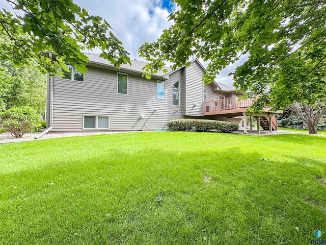 108 W Hazeltine Ln, Sioux Falls, SD 57108 - back of house featuring a wooden deck, a yard, stairway, and roof with shingles