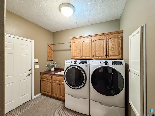 108 W Hazeltine Ln, Sioux Falls, SD 57108 - washroom with cabinet space, separate washer and dryer, light carpet, and a textured ceiling