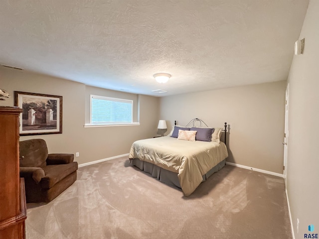 108 W Hazeltine Ln, Sioux Falls, SD 57108 - carpeted bedroom with baseboards and a textured ceiling