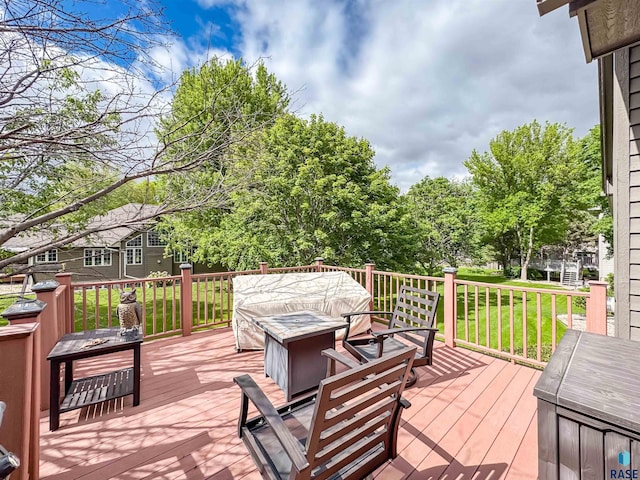 108 W Hazeltine Ln, Sioux Falls, SD 57108 - wooden deck featuring an outdoor fire pit