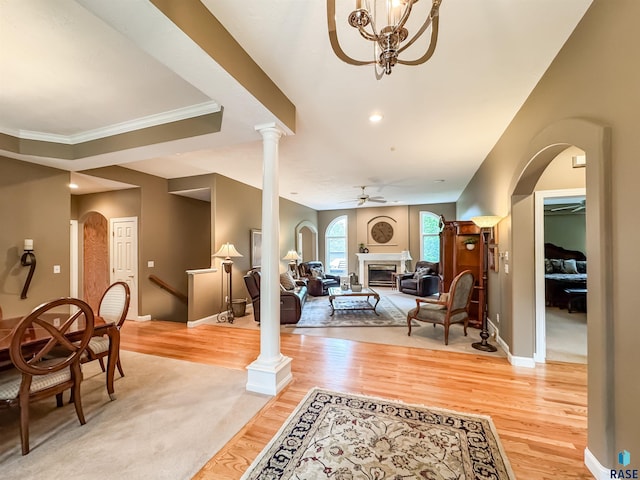 108 W Hazeltine Ln, Sioux Falls, SD 57108 - foyer featuring ceiling fan, light wood-style flooring, arched walkways, baseboards, and ornamental molding