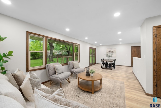 1912 E Sylvan Cir, Brandon, SD 57005 - living area with recessed lighting, light wood-type flooring, and baseboards