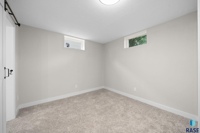 1912 E Sylvan Cir, Brandon, SD 57005 - basement featuring carpet flooring, baseboards, and plenty of natural light