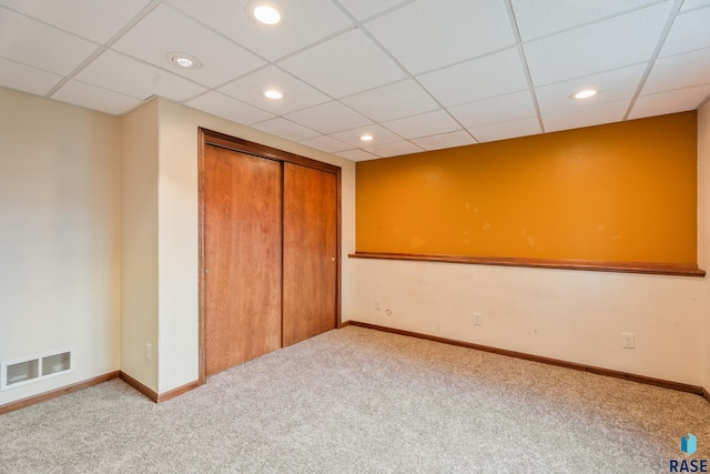 605 N Daisy Ave, Sioux Falls, SD 57107 - unfurnished bedroom featuring carpet, a closet, recessed lighting, baseboards, and a paneled ceiling