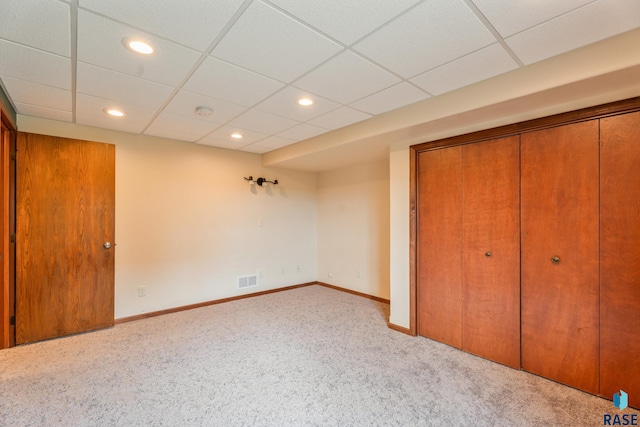 605 N Daisy Ave, Sioux Falls, SD 57107 - unfurnished bedroom featuring carpet floors, a closet, recessed lighting, a drop ceiling, and baseboards