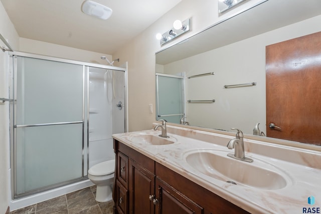 605 N Daisy Ave, Sioux Falls, SD 57107 - full bath featuring toilet, double vanity, and a shower stall