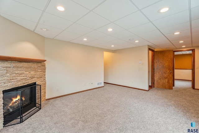 605 N Daisy Ave, Sioux Falls, SD 57107 - unfurnished living room with carpet flooring, recessed lighting, baseboards, and a drop ceiling