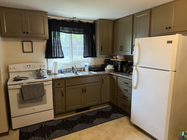 822 S Jessica Ave, Sioux Falls, SD 57103 - kitchen featuring white appliances, a sink, and dark countertops